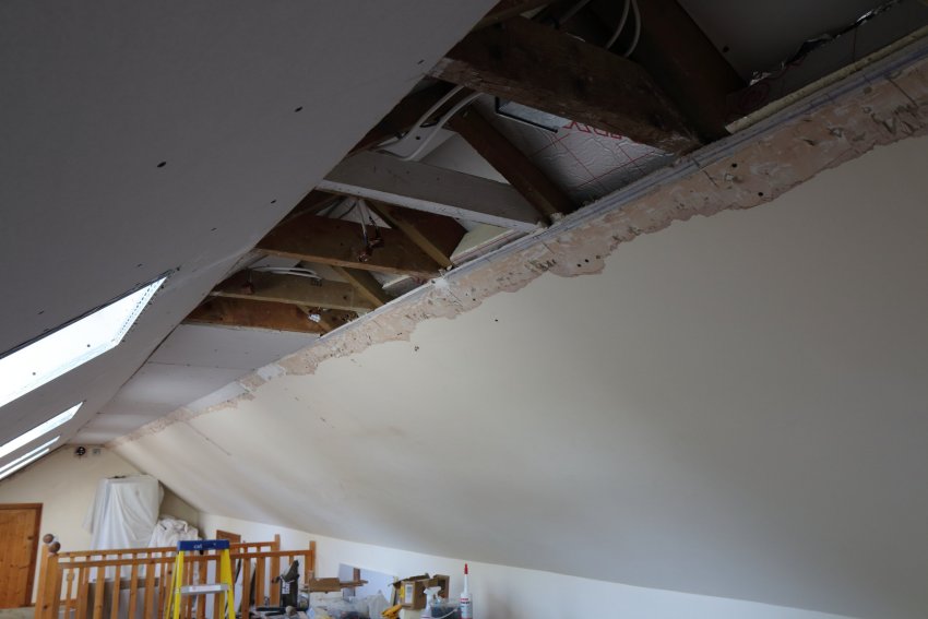 Getting must of the plasterboard done on the ceiling.